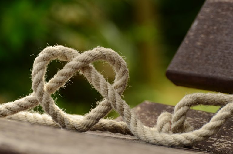 rope tied to make a heart shaped knot