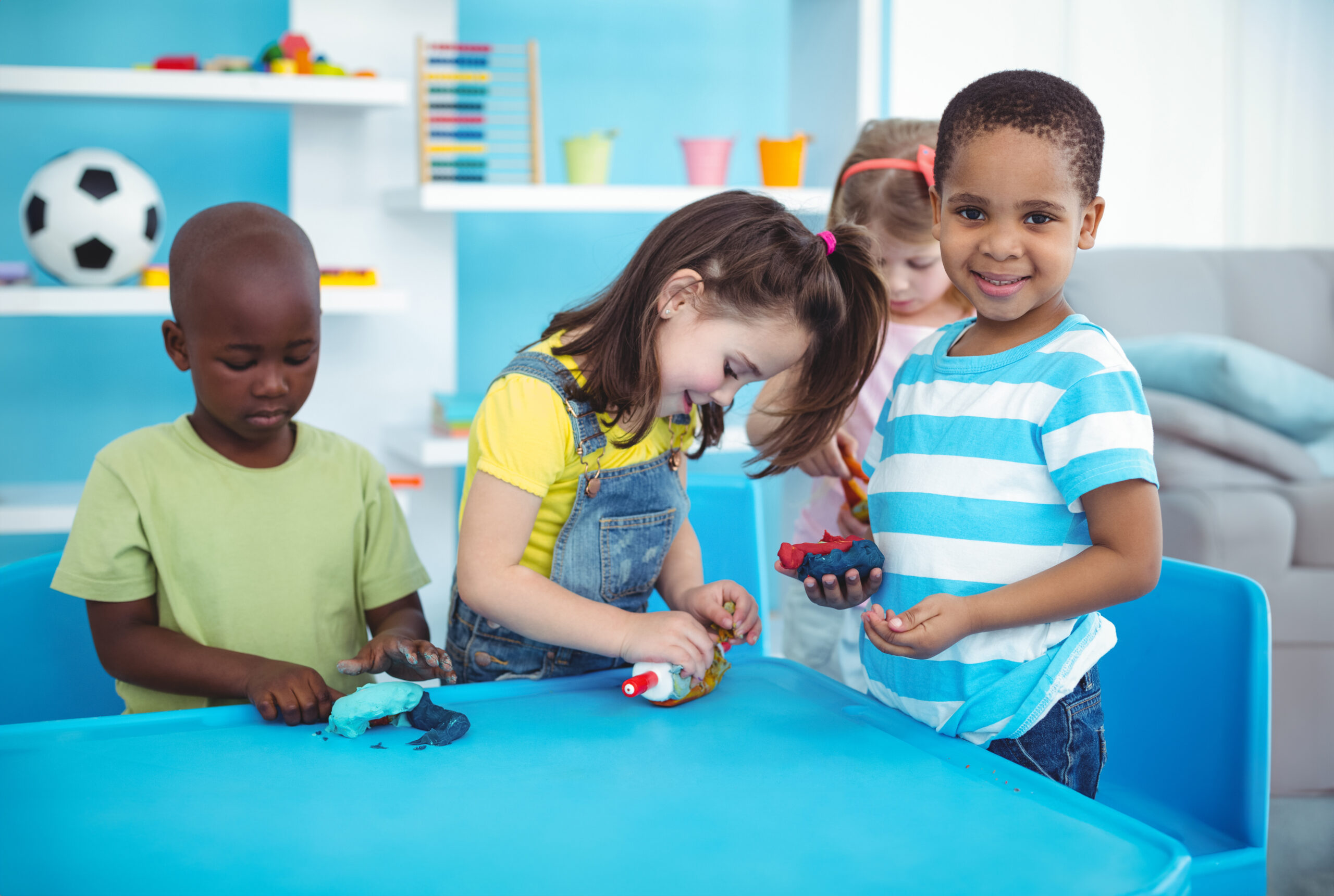 Children playing with play dough